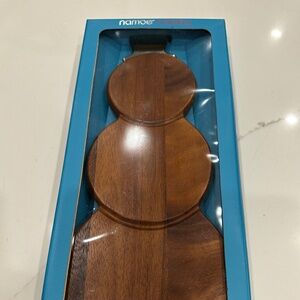 Snow man cutting board by Nombe
